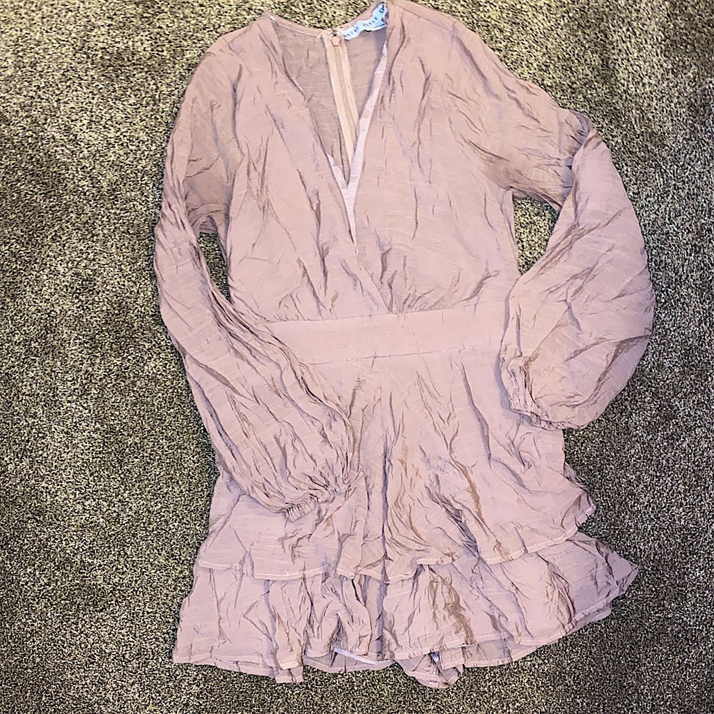 3/10. Size medium romper